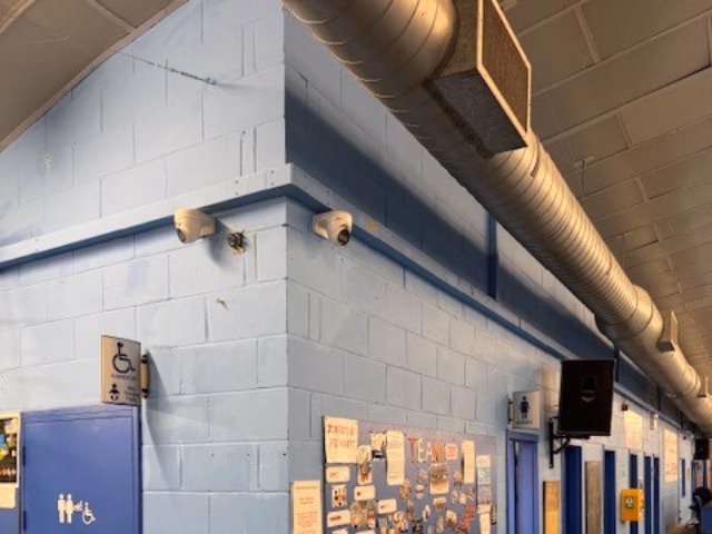 Cameras covering a corridor and the side entrance
