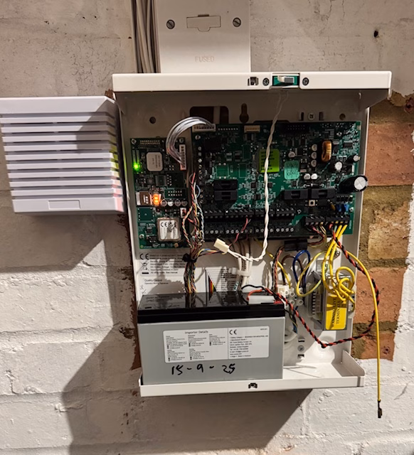 A open intruder alarm panel, installed in a warehouse in windsor