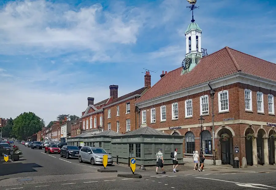 Castle Street in Farnham with Georgian red-brick buildings and the old Town Hall clock tower